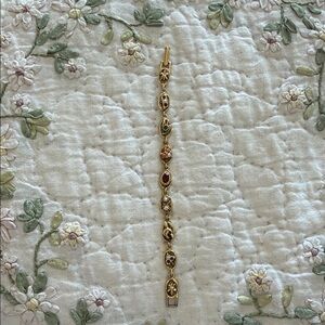 Elegant Gold and Multicolor Gemstone Bracelet marked goldette vintage 1958